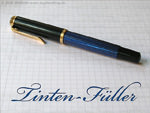 Tintenfüller (Füllfederhalter mit goldenen Einfassungen)